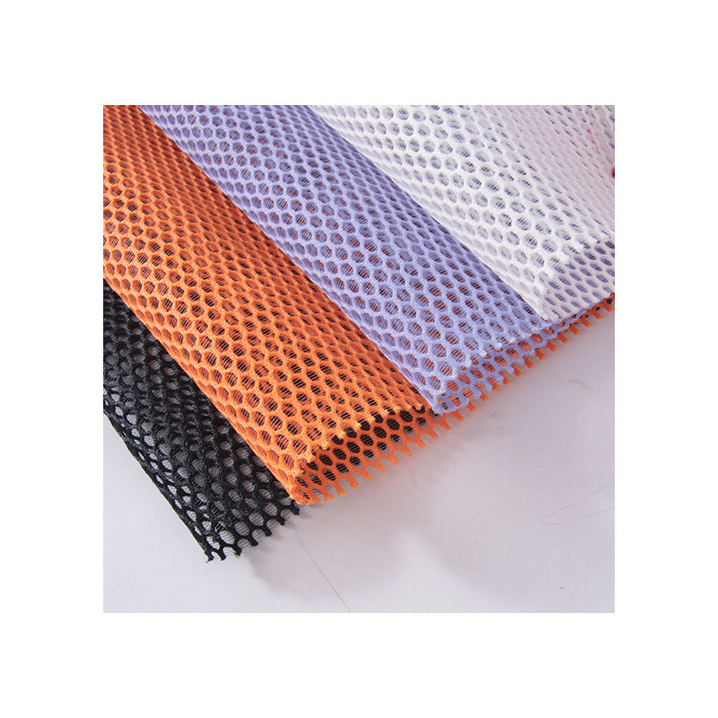 "Manufacturer in-stock single-layer round hole mesh fabric, round hole double-round brushed mesh fabric, breathable mesh fabric for bags, handbags, and sofas."